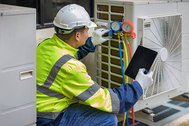 Professional Air Conditioning Repair technician working in White Pigeon, MI